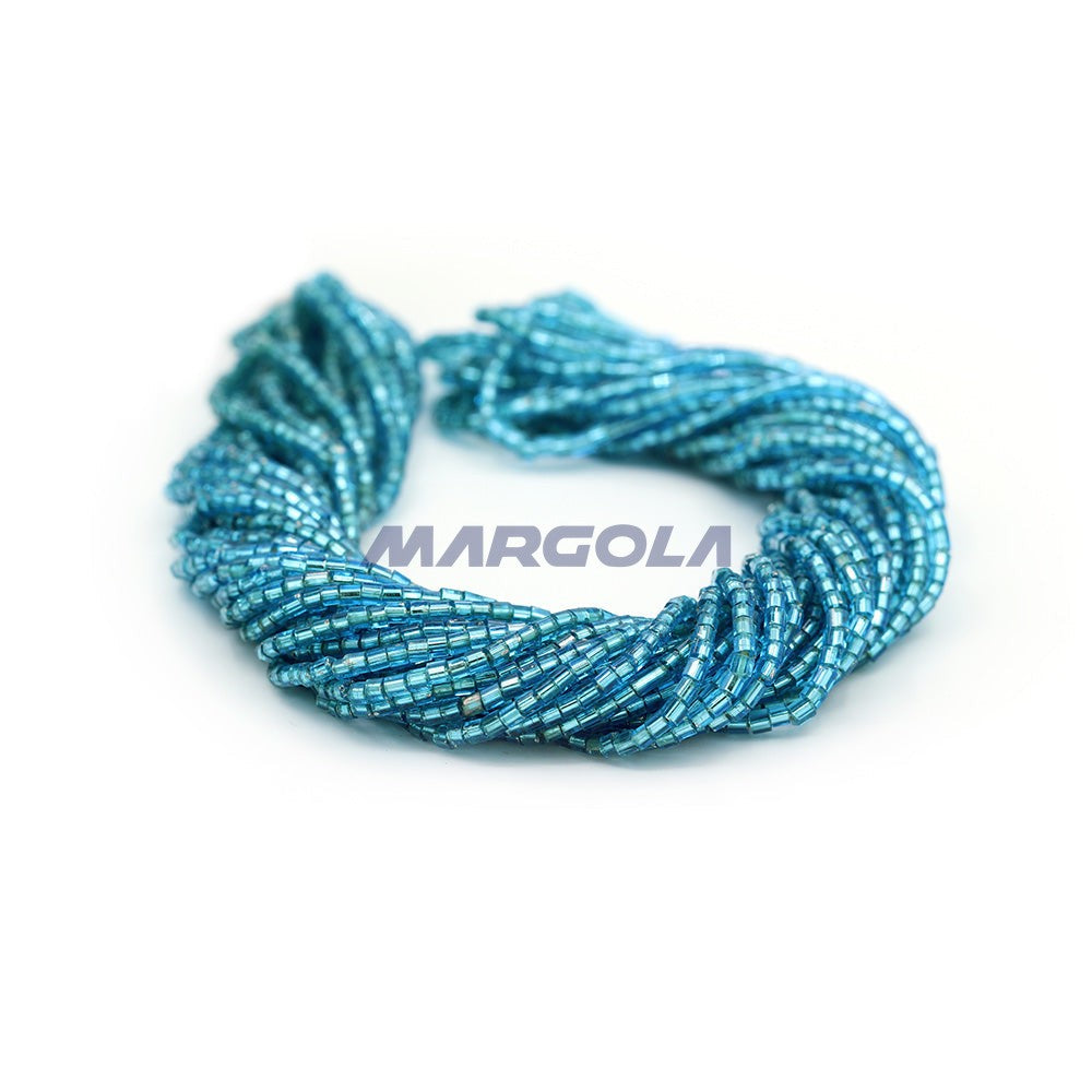 2 CUT 10/0 DK. AQUAMARINE TRANSPARENT SILVER LINED PRECIOSA ORNELA BEADS